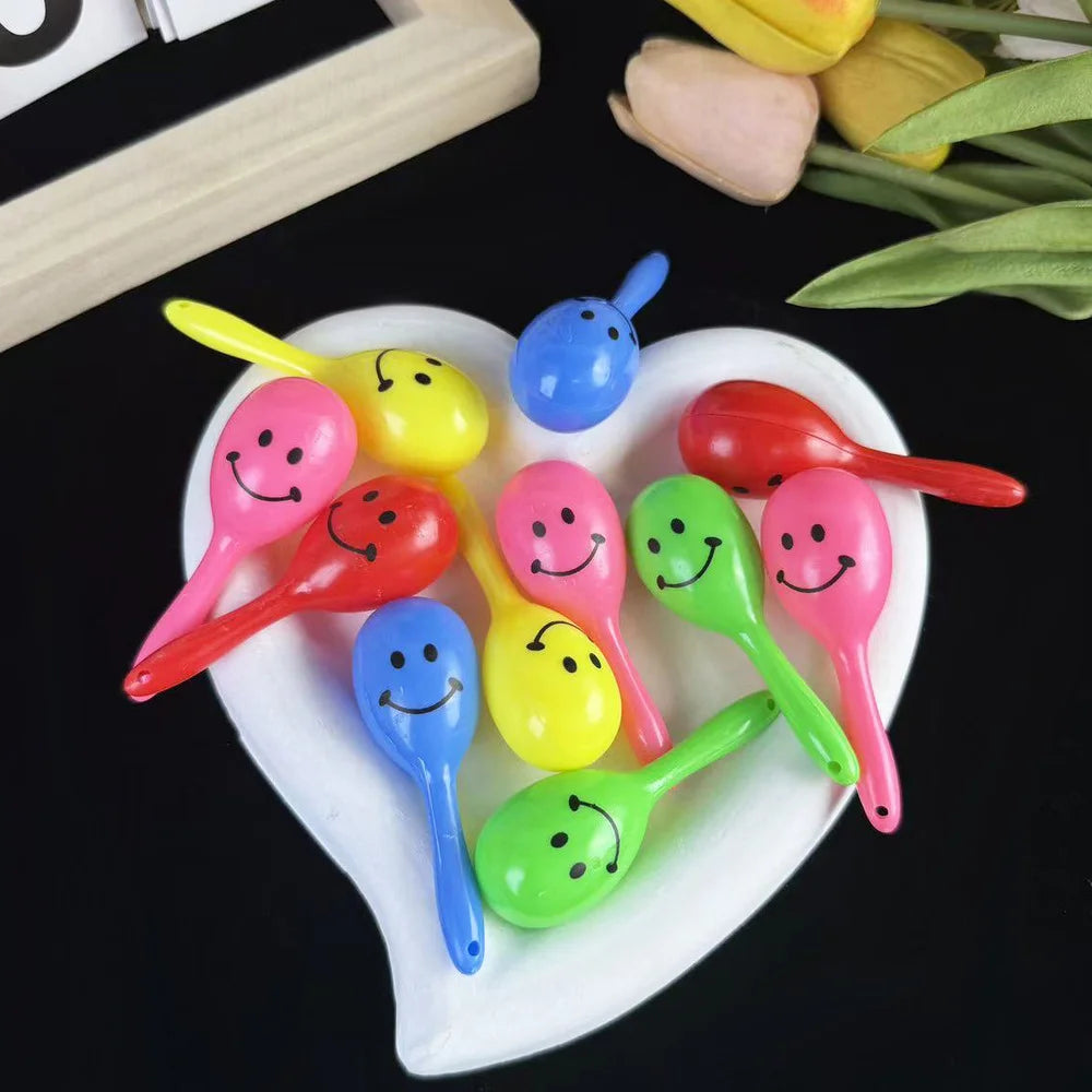 Neon Smily Face Mini Maracas 10pcs Party Favours